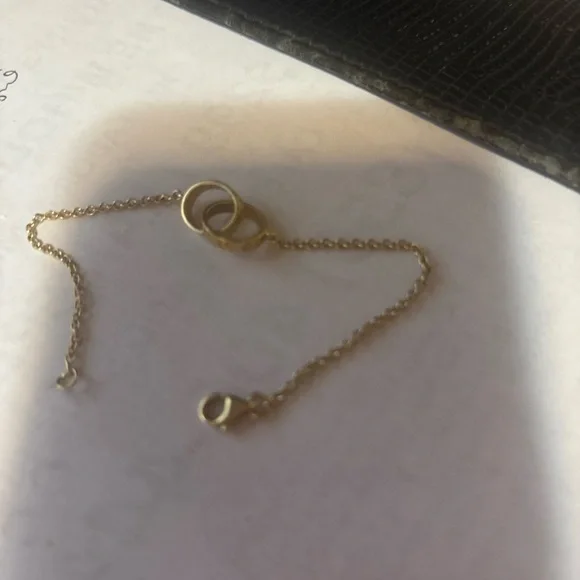 Cartier Gold Interlocking Rings Bracelet with Delicate Chain - Picture 5 of 12